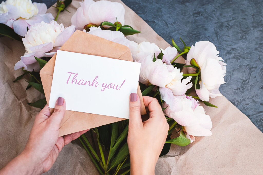 Thank you card in hands